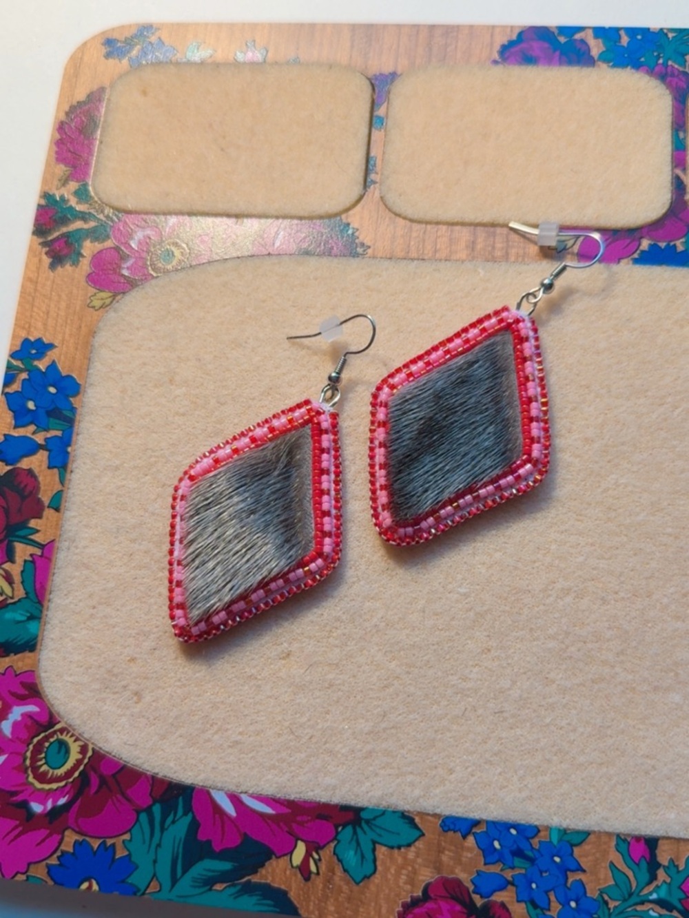 Beaded earrings, with seal skin & caribou hide